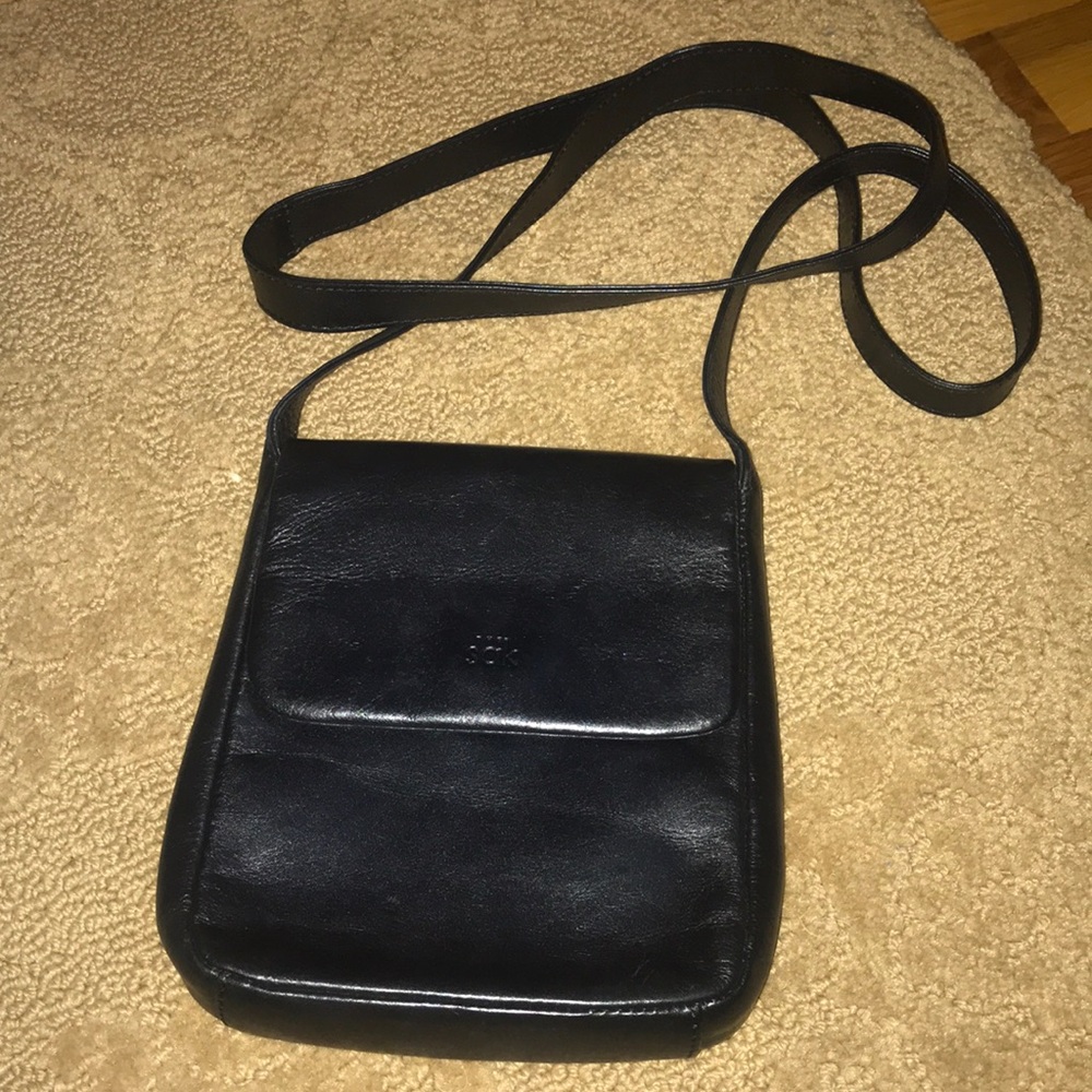The Sak black leather cross body purse